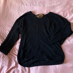 Black sweater with bow